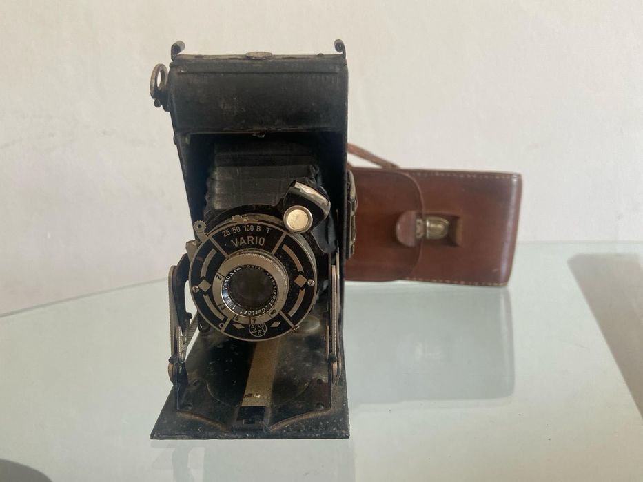 Máquina fotográfica antiga429044519068641285
