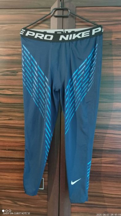 Legginsy Nike 3/4 niebieskie kompresyjne L