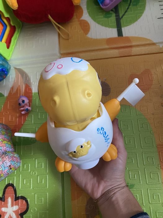 Іграшковий динозаврик