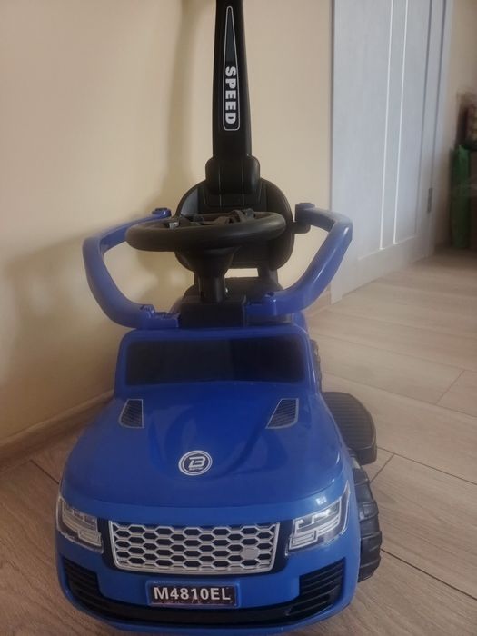 Дитячий толокар машина з ручкою