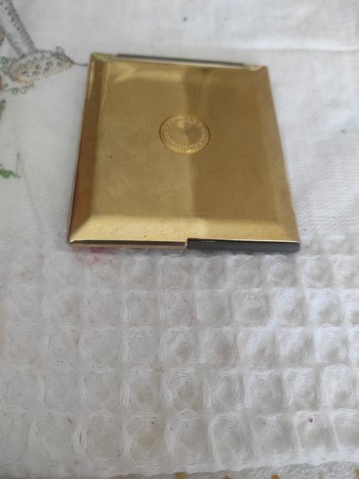 Espelho de Maquiagem e Óculos de sol