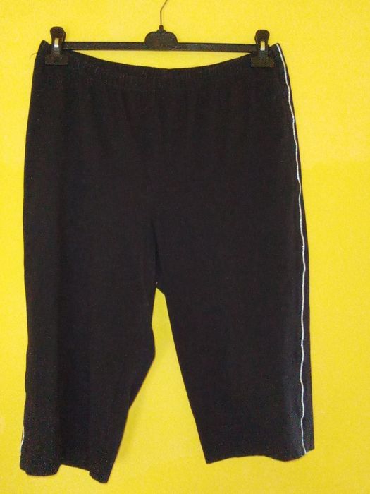 Czarne rybaczki ze srebrną wypustką , elastyczne 42/44