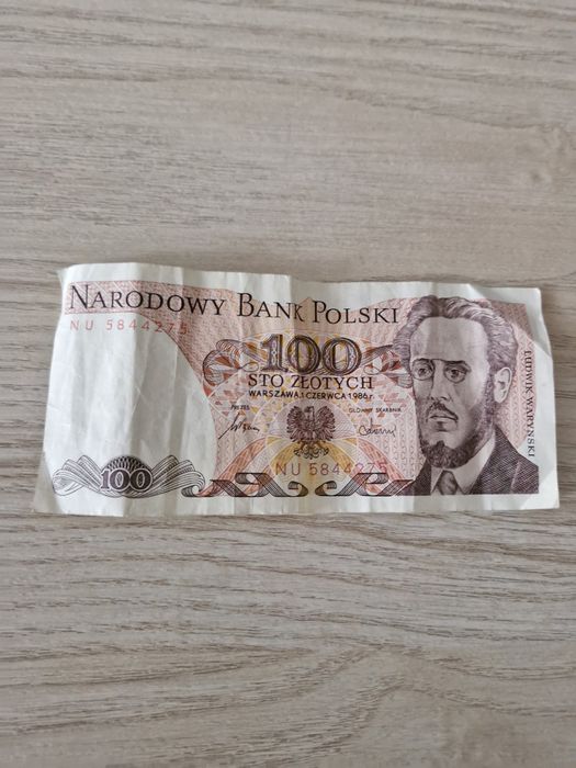 banknot 100 zł z 1986 roku (PRL) z wizerunkiem Ludwika Waryńskiego.