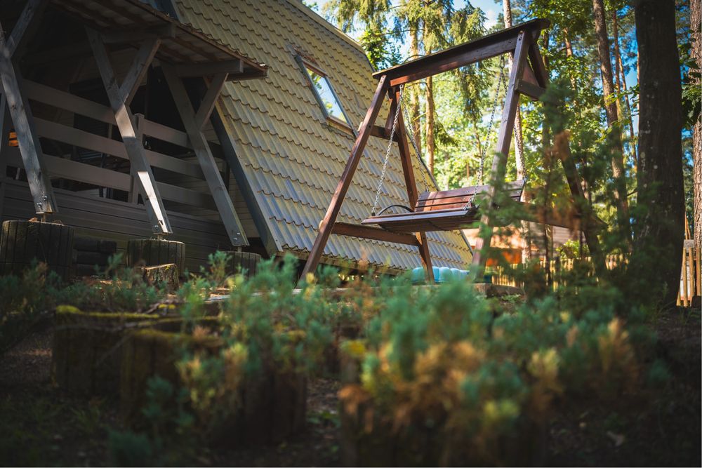 Domek nad jeziorem Warmia i Mazury łódka pomost