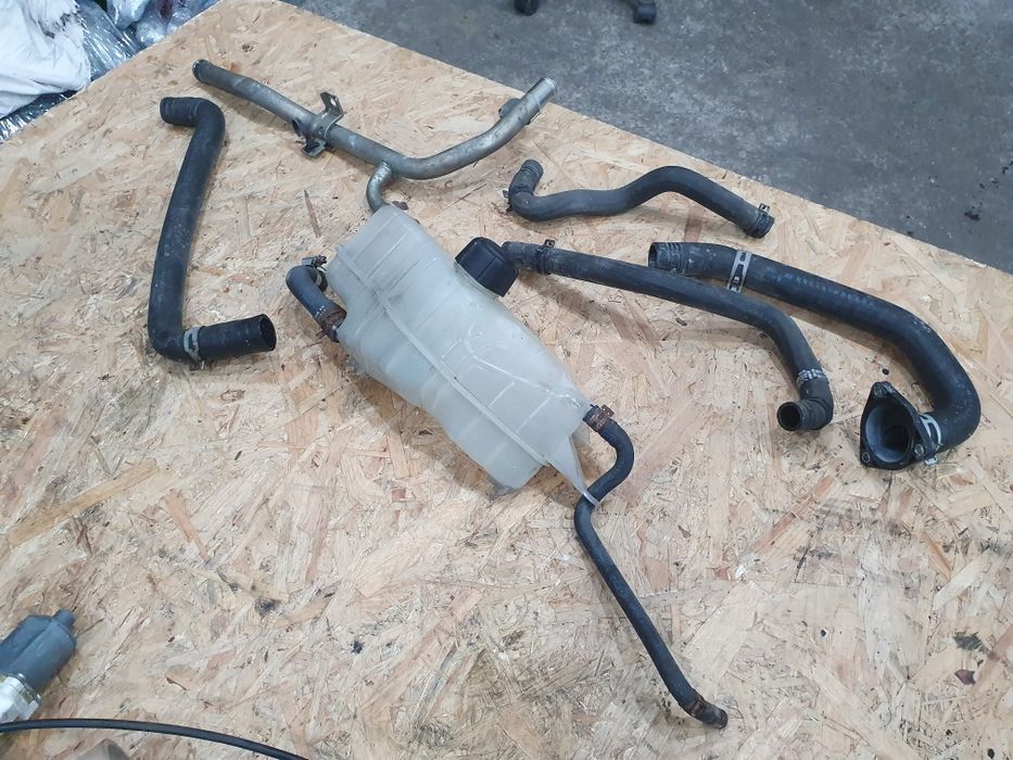 Magistrala króciec zbiorniczek wąż wodny Nissan Micra k12 1.2 04r