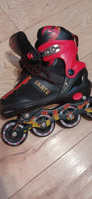 Дитячі яскраві майже нові ролики рр 35 38,