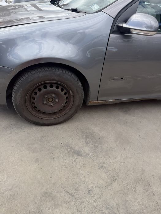 Błotnik Volkswagen Golf V LA7T lewy prawy przód