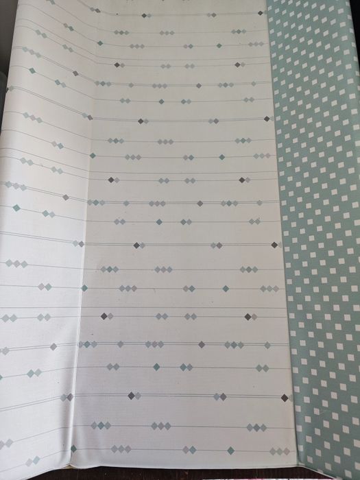 Muda fraldas rígido