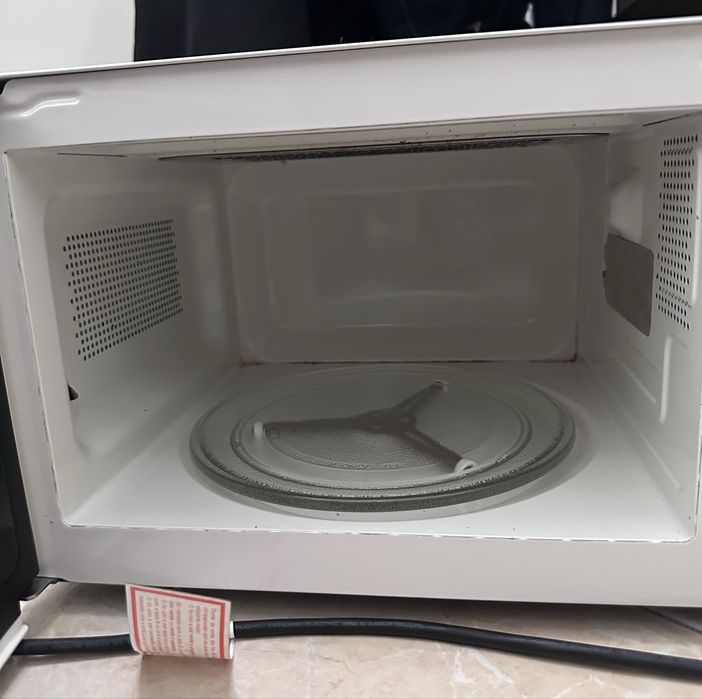 Microondas usado, mas funcional