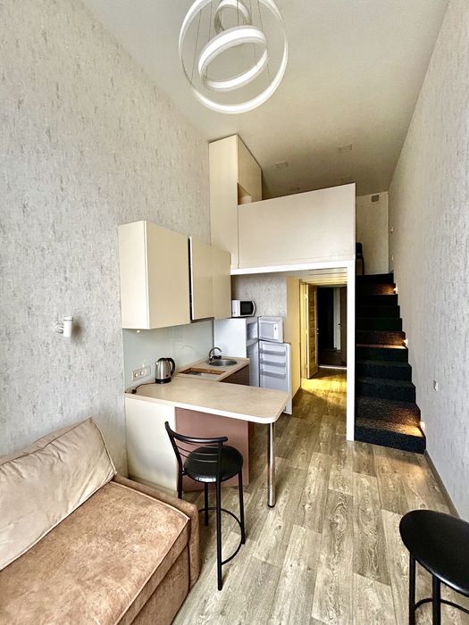 Продаж Дворівнева гостинка 20 м² у ЖК «Воробйові Гори» з якісним ремонтом, меблями та технікою