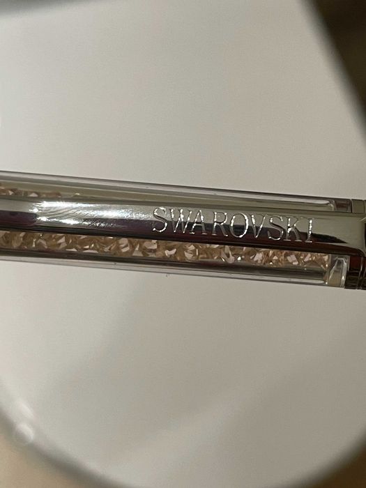 Caneta Swarowski dourada e com cristais dourados
