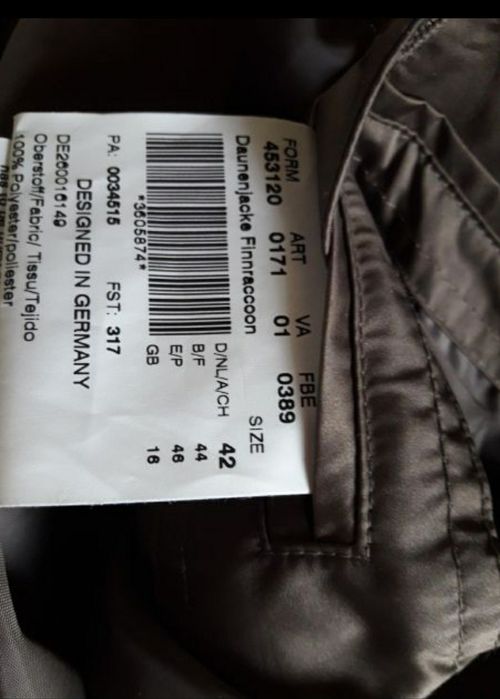 Продам  новое зимнее пуховое пальто " Baronia" с воротником из енота