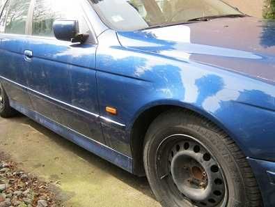 Błotnik drzwi , mechanizm szyby, zamek  e39 touring topasblau