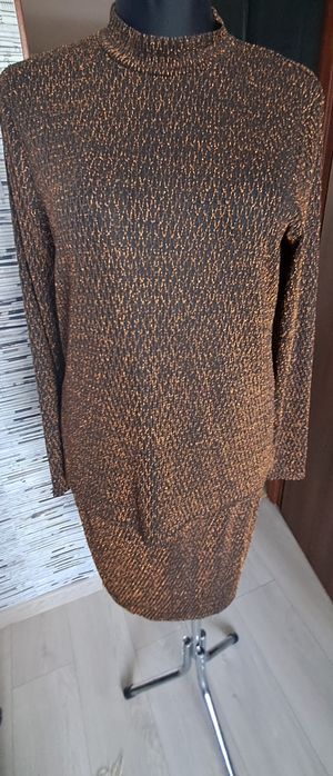 Sliczny czarno złotym komplet bluzka i spódnica