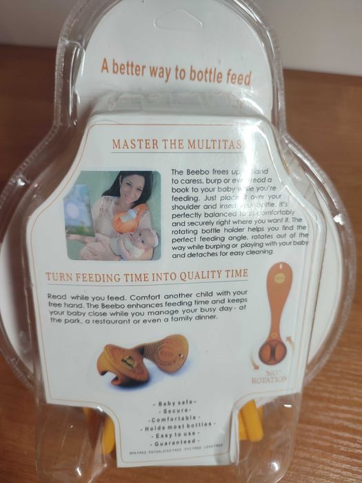 Uchwyt na butelkę do karmienia dziecka – Free Hand Bottle Holder