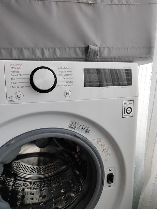 Máquina de lavar roupa como nova