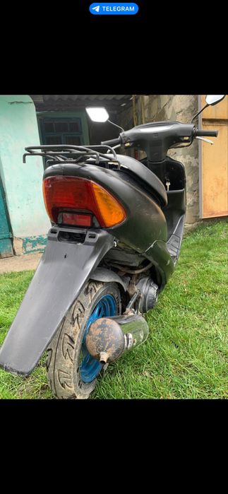 Скутер honda dio