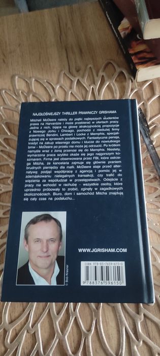 Firma John Grisman