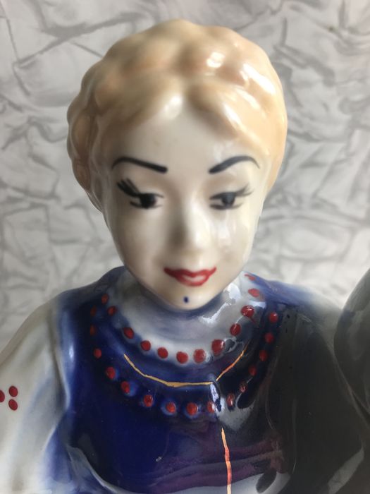Штоф Солоха біля паркану