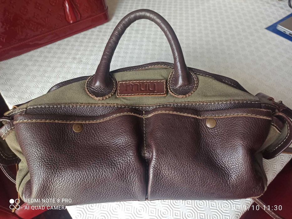 Mala de mão, marca "MUU", nova.