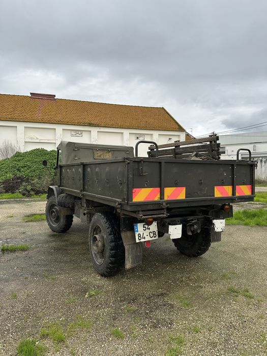 Unimog 404 gasolina com muito material reposição