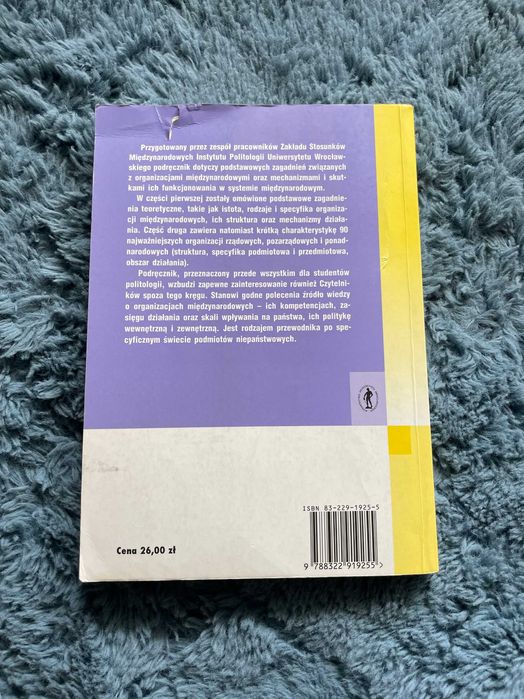 Organizacje w stosunkach międzynarodowych, Łoś-Nowak