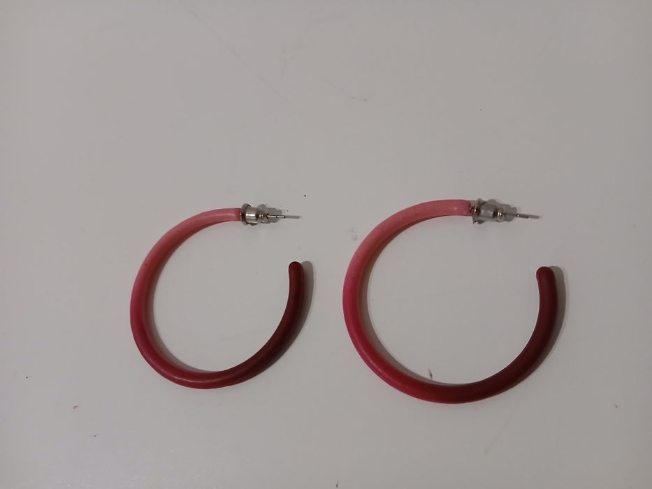 Argolas plásticas em degrade de rosa