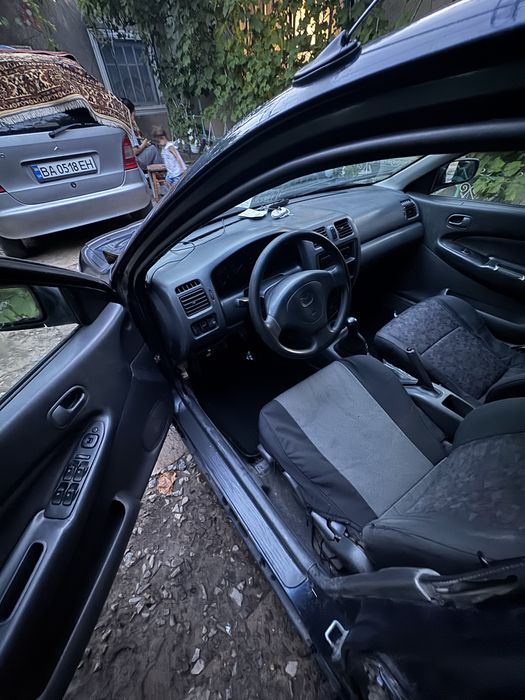 Продам mazda 323