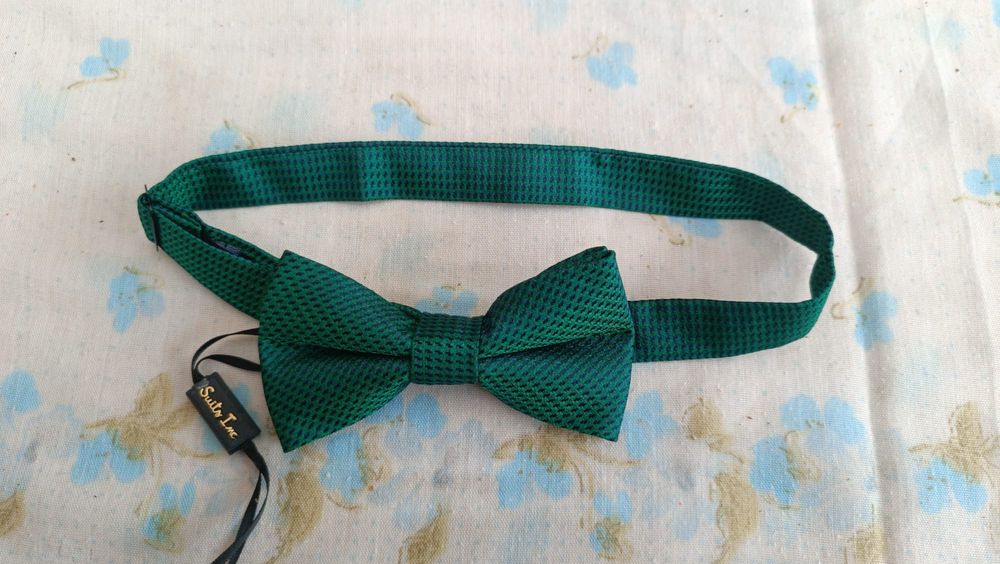 laço verde da suits