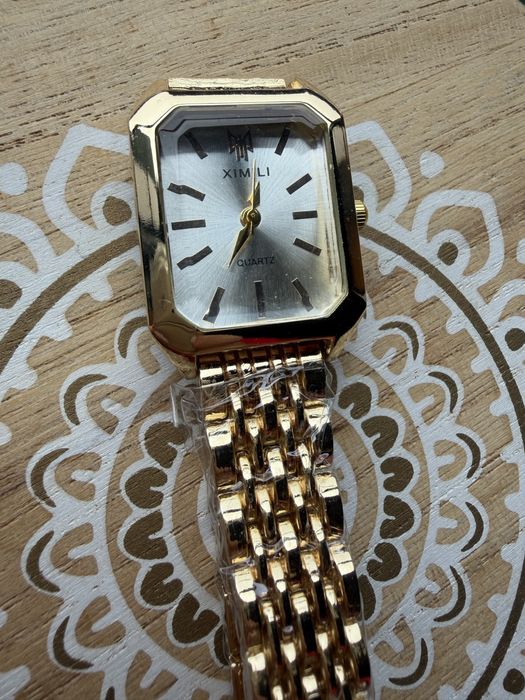 Relogio dourado senhora