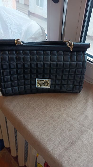 Дефекти на фото, на ремонт, реставрацію , фурнітура  dolce & gabbana, кожаная dolce gabbana