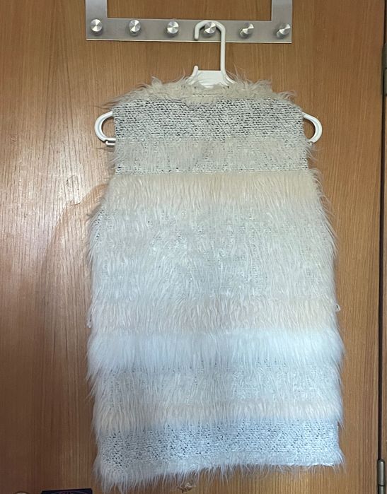 Casaco de pelo sem mangas