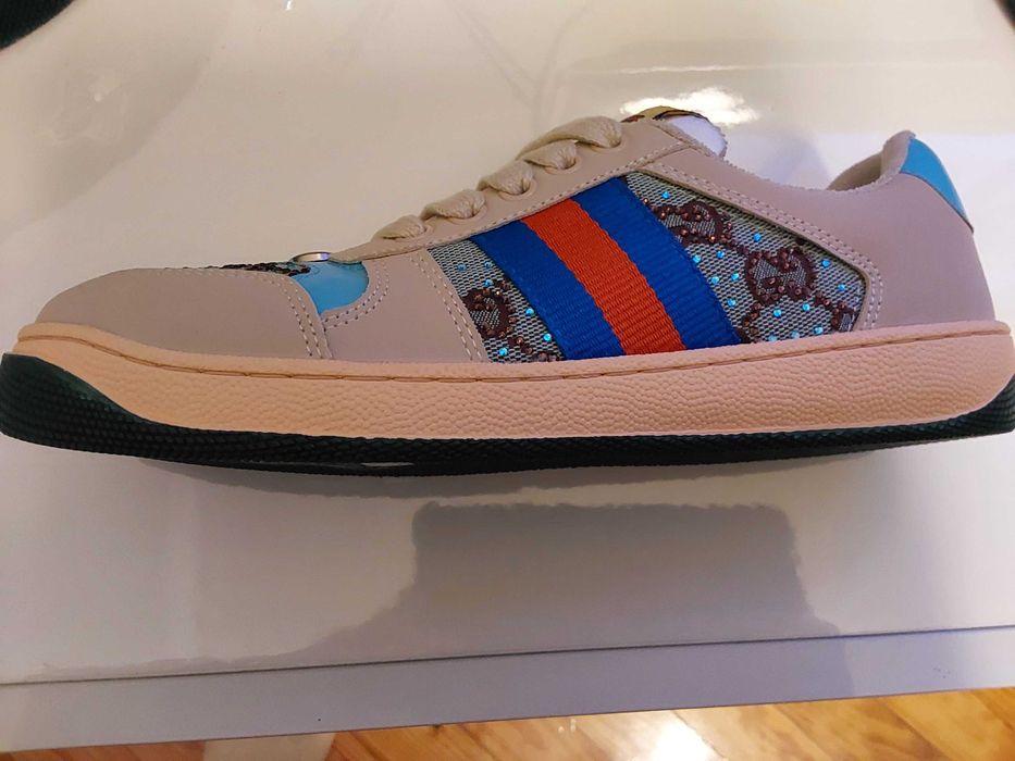 Sapatilhas Gucci.