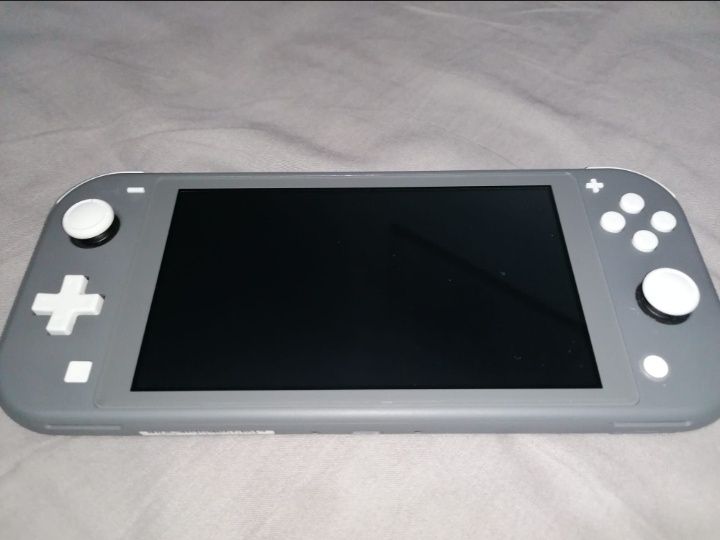 Nintendo switch modelo LITE já desbloqueada com vários extras