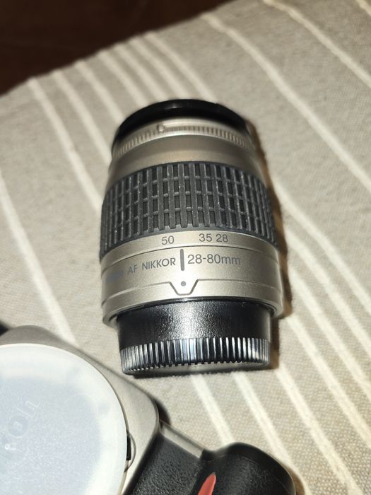 Máquina Nikon f65 como Nova