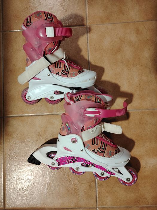 Patins em linha rosa e branco da deeply com protetores