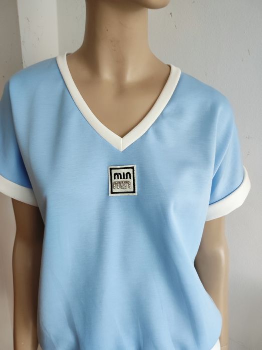 Damski krótki komplet w materiale masełko