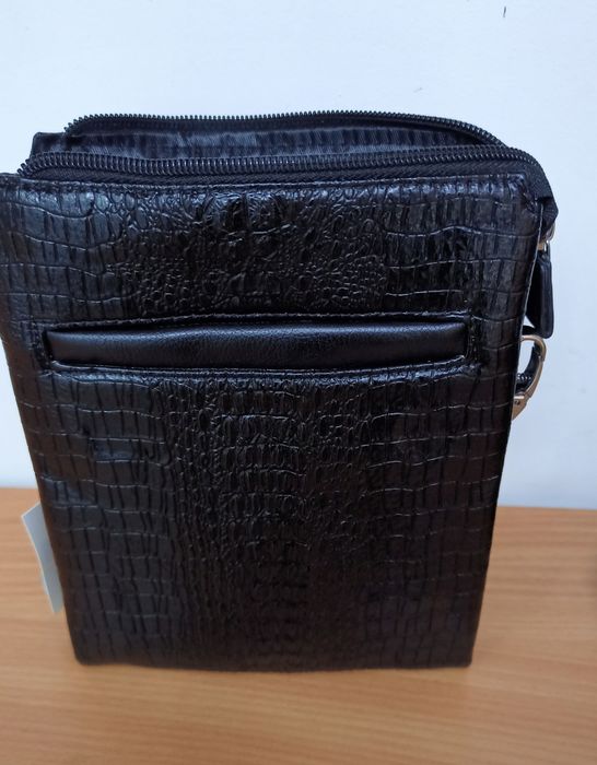 Оригінальна чоловіча сумка-барсетка.