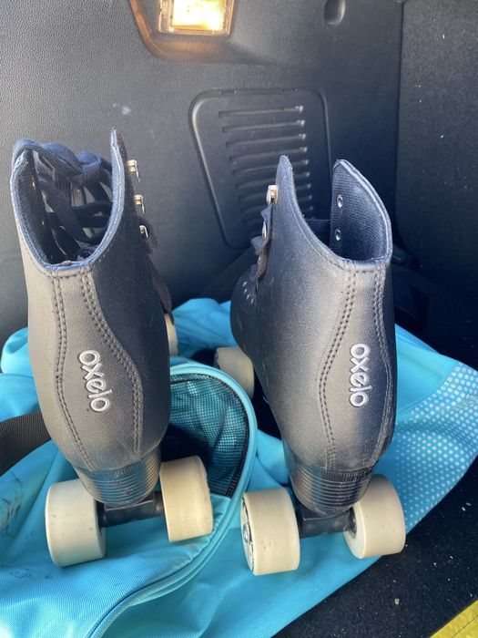 Patins pretos com saco