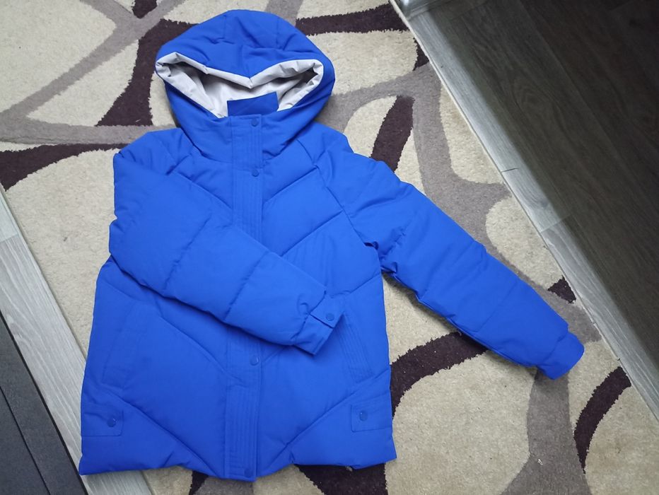 Продам пуховик синий