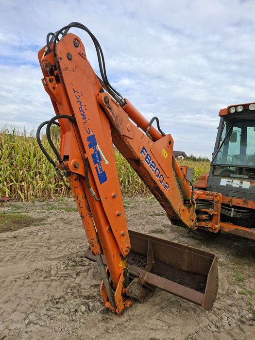 Koparkoładowarka New Holland LB 115. Fiat Hitachi FB200.2