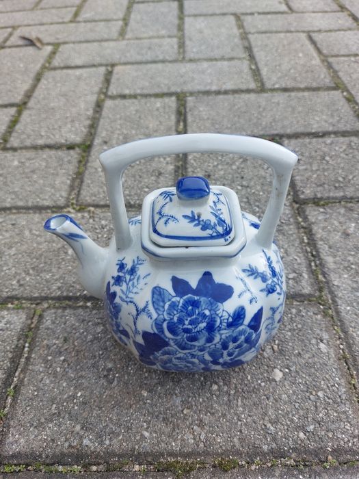 Bule azul em bom estado