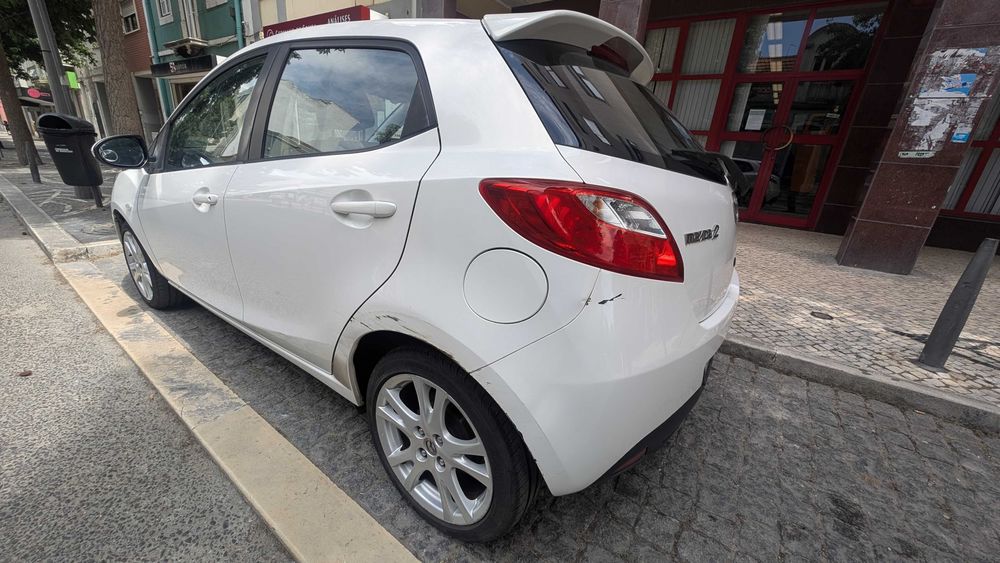 Mazda 2 1.3 gasolina +-211 mil KMS com AC 2010