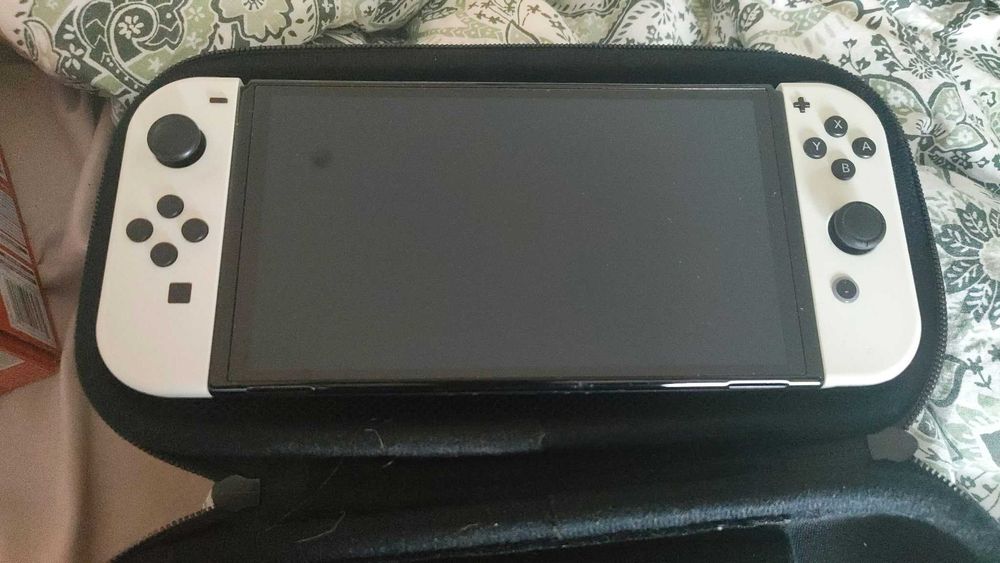 Nintendo Switch OLED 64GB + Mala + Caixa e Acessórios — 235€