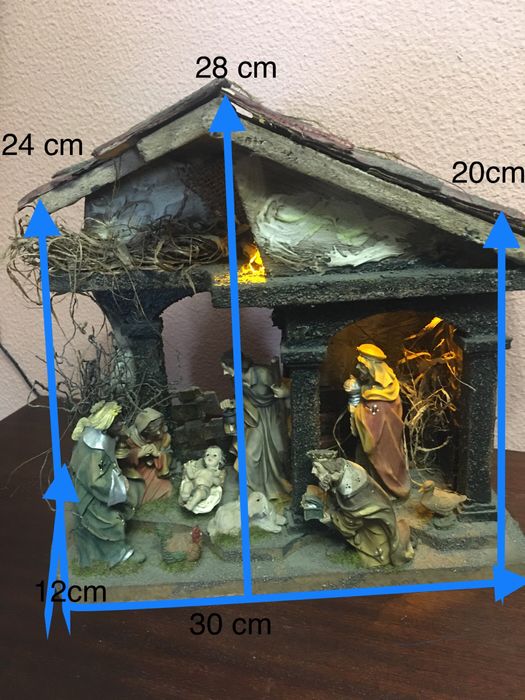 Presépio iluminado e com música