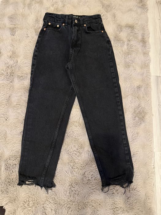 Damskie jeansy koloru czarnego 34