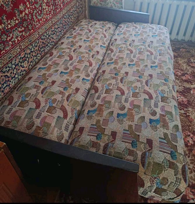 Диван розкладной перетянутый.