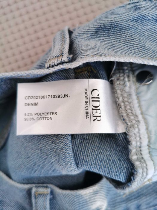 Hit  Spodnie Cider jeansy patchworkowe z przetarciami XS