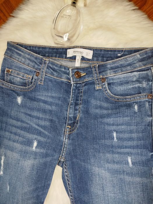 Niebieskie ciemnoniebieskie jeansy damskie wysoki stan Mango 36 S