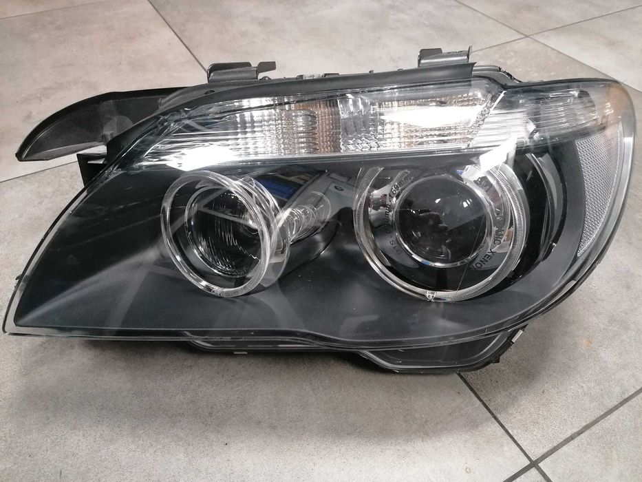 BMW E65 E66 Reflektor lewy ksenon skrętny NOWY xenon AHL oryginalny